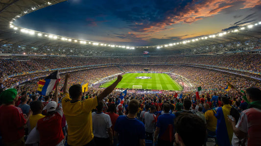 Football supporters wearing colourful shirts before the 2026 World Cup Final